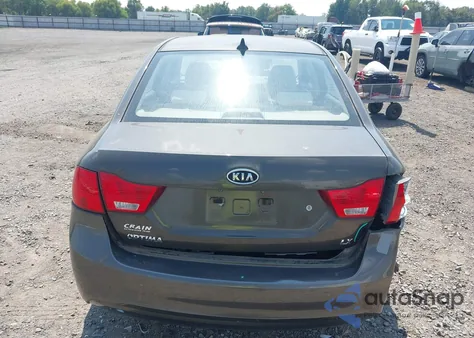 2009 Kia Optima Lx z USA, uszkodzony, nr VIN KNAGE228X95292719